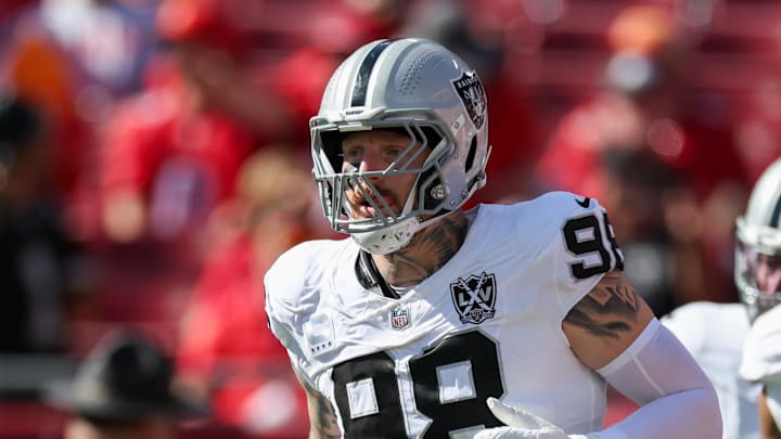 Dec 8, 2024; Tampa, Florida, USA; Las Vegas Raiders defensive end Maxx Crosby (98) takes the field for a game against the Tampa Bay Buccaneers at Raymond James Stadium. Mandatory Credit: Nathan Ray Seebeck-Imagn Images