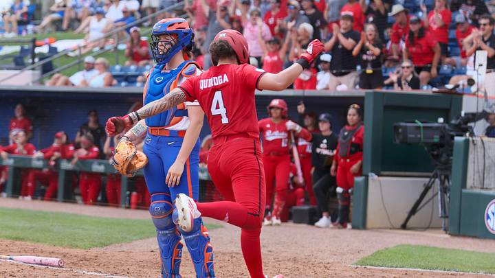Texas Tech catcher Lagi Quiroga (4) scores during the super regional game of the NCAA Division 1 softball championship at Katie Seashole Pressly Stadium in Gainesville, FL on Friday, May 22, 2026. [Alan Youngblood/Gainesville Sun]