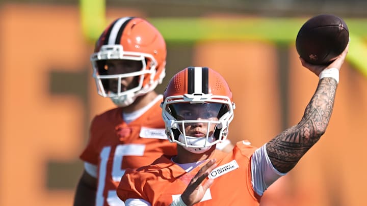 Jul 23, 2025; Berea, OH, USA; Cleveland Browns quarterback Dillon Gabriel (5) throws a pass as quarterback Joe Flacco (15) looks on during training camp at CrossCountry Mortgage Campus. Mandatory Credit: Ken Blaze-Imagn Images