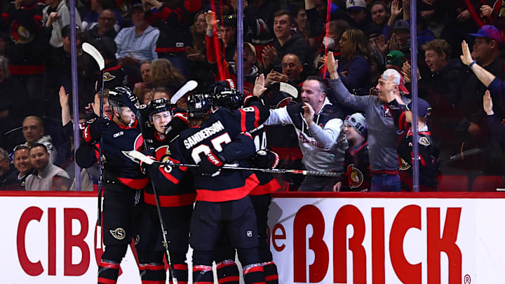 Apr 7, 2026; Ottawa, Ontario, CAN; The Ottawa Senators celebrate defenseman Jordan Spence (10) goal against the Tampa Bay Lightning during the second period at Canadian Tire Centre. Mandatory Credit: Keito Newman-Imagn Images
Apr 7, 2026; Ottawa, Ontario, CAN; The Ottawa Senators celebrate defenseman Jordan Spence (10) goal against the Tampa Bay Lightning during the second period at Canadian Tire Centre. Mandatory Credit: Keito Newman-Imagn Images