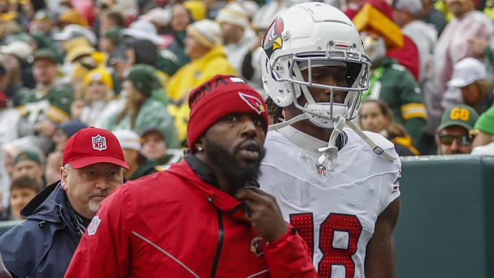 Oct 13, 2024; Green Bay, Wisconsin, USA; Arizona Cardinals wide receiver Marvin Harrison Jr. (18) heads to the locker room after sustaining a head injury against the Green Bay Packers at Lambeau Field. Mandatory Credit: Tork Mason/USA TODAY NETWORK-via Imagn Images