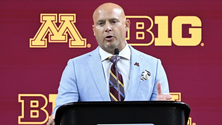 Jul 25, 2024; Indianapolis, IN, USA; Minnesota Golden Gophers head coach P.J. Fleck speaks to the media during the Big 10 football media day at Lucas Oil Stadium. Mandatory Credit: Robert Goddin-USA TODAY Sports Jul 25, 2024; Indianapolis, IN, USA; Minnesota Golden Gophers head coach P.J. Fleck speaks to the media during the Big 10 football media day at Lucas Oil Stadium. Mandatory Credit: Robert Goddin-USA TODAY Sports