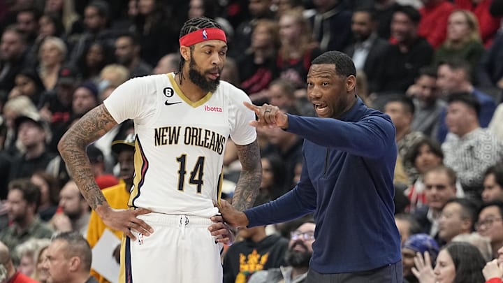 Feb 23, 2023; Toronto, Ontario, CAN; New Orleans Pelicans head coach Willie Green talks to forward Brandon Ingram (14) during a break in the action the Toronto Raptors  in the second half at Scotiabank Arena. 