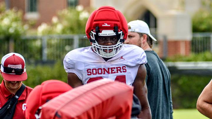 Oklahoma defensive end Adepoju Adebawore practices during fall camp. Oklahoma defensive end Adepoju Adebawore practices during fall camp.