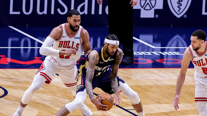 Mar 3, 2021; New Orleans, Louisiana, USA;  New Orleans Pelicans forward Brandon Ingram (14) dribbles against Chicago Bulls guard Zach LaVine (8) during the second half at Smoothie King Center. Mandatory Credit: Stephen Lew-Imagn Images