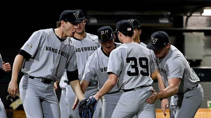 Vanderbilt pitcher Connor Fennell is congratulated after striking out a Tennessee Tech batter for the third out