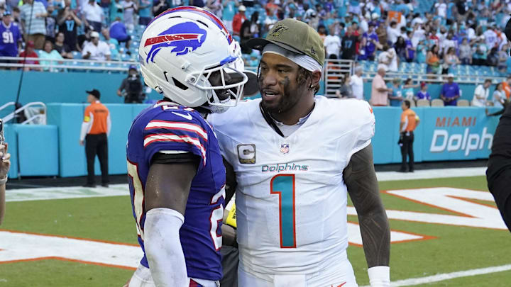 Miami Dolphins quarterback Tua Tagovailoa (1) talks to Buffalo Bills cornerback Tre'Davious White (27) after defeating the Bills at Hard Rock Stadium.