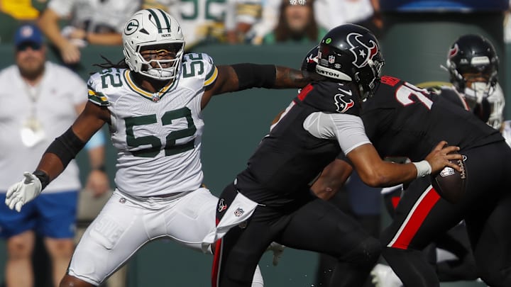 Oct 20, 2024; Green Bay, Wisconsin, USA;  Green Bay Packers defensive end Rashan Gary (52) rushes Houston Texans quarterback C.J. Stroud (7)  at Lambeau Field. Mandatory Credit: Tork Mason/Green Bay Press-Gazette via the USA TODAY NETWORK-Wisconsin-Imagn Images