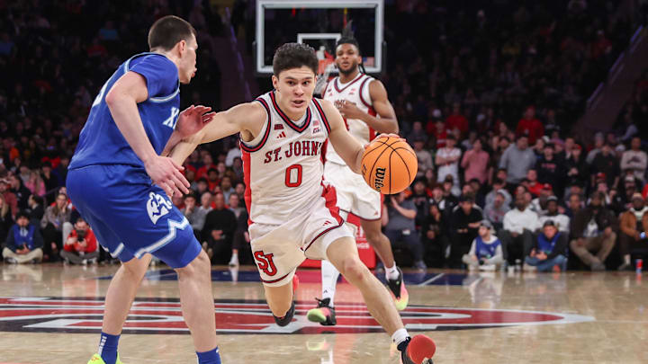 Feb 9, 2026; New York, New York, USA; St. John's basketball guard Dylan Darling (0) looks to drive past Xavier Musketeers guard All Wright (3) in the second half at Madison Square Garden Feb 9, 2026; New York, New York, USA; St. John's basketball guard Dylan Darling (0) looks to drive past Xavier Musketeers guard All Wright (3) in the second half at Madison Square Garden