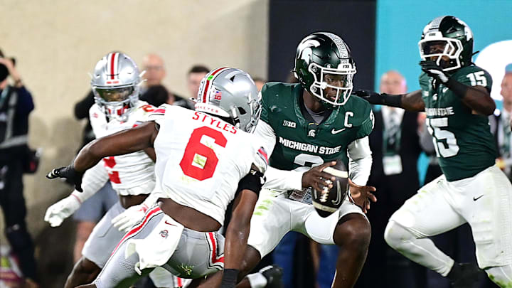 Sep 28, 2024; East Lansing, Michigan, USA; Michigan State Spartans quarterback Aidan Chiles (2) scrambles in the third quarter against the Ohio State Buckeyes at Spartan Stadium. Mandatory Credit: Dale Young-Imagn Images Sep 28, 2024; East Lansing, Michigan, USA; Michigan State Spartans quarterback Aidan Chiles (2) scrambles in the third quarter against the Ohio State Buckeyes at Spartan Stadium. Mandatory Credit: Dale Young-Imagn Images