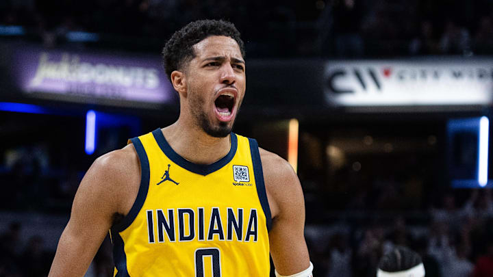 Mar 31, 2025; Indianapolis, Indiana, USA; Indiana Pacers guard Tyrese Haliburton (0) celebrates the game winning basket in the second half against the Sacramento Kings at Gainbridge Fieldhouse. Mandatory Credit: Trevor Ruszkowski-Imagn Images