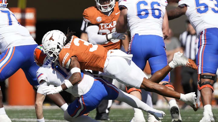 Nov 9, 2024; Austin, Texas, USA; Texas Longhorns defensive back Jaylon Guilbeau (3) sacks Florida Gators Aidan Warner (16) during the first half at Darrell K Royal-Texas Memorial Stadium. Mandatory Credit: Scott Wachter-Imagn Images