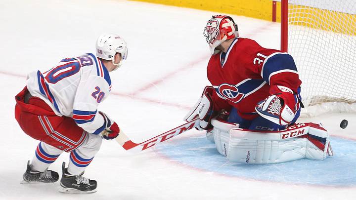 May 17, 2014; Montreal, Quebec, CAN; New York Rangers left wing Chris Kreider (20) scores a goal against Montreal Canadiens goalie Carey Price (31) during the second period in game one of the Eastern Conference Finals of the 2014 Stanley Cup Playoffs at Bell Centre. Mandatory Credit: Jean-Yves Ahern-USA TODAY Sports