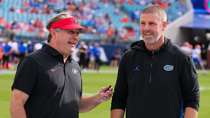 Georgia Bulldogs head coach Kirby Smart and Florida Gators head coach Billy Napier talk before the game before the first half at EverBank Stadium in Jacksonville, FL on Saturday, November 2, 2024. [Doug Engle/Gainesville Sun]