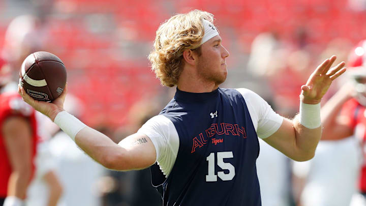 Auburn quarterback Hank Brown (15) warms up before the start of a NCAA college football game against Georgia in Athens, Ga., on Saturday, Oct. 5, 2024.