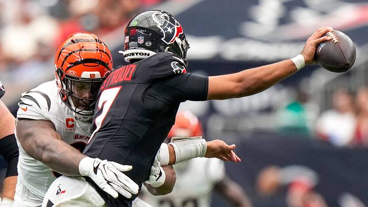 Cincinnati Bengals defensive tackle Dexter Lawrence II (97) wraps up Houston Texans quarterback C.J. Stroud (7) for a sack in the fourth quarter of the NFL Week 2 game between the Houston Texans and the Cincinnati Bengals at Reliant Stadium in Houston on Sunday, Sept. 20, 2026. The Bengals improved to 2-0 on the season with a 20-6 win on the road.
