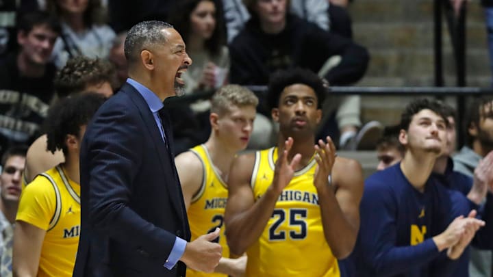 Michigan Wolverines head coach Juwan Howard yells down court during the NCAA men   s basketball game