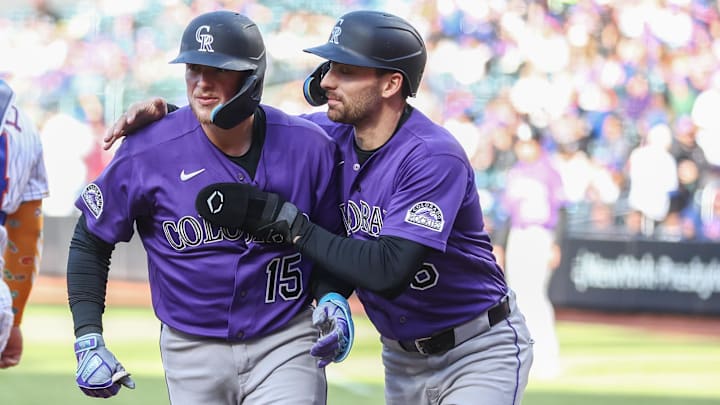 Colorado Rockies catcher Hunter Goodman celebrates with second baseman Edouard Julien 