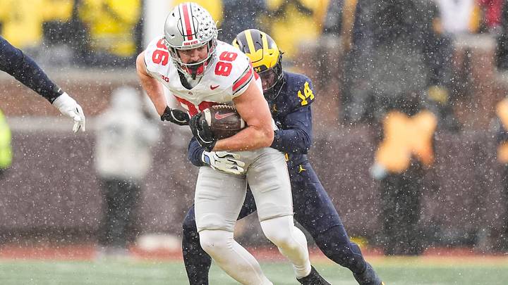 Ohio State tight end Max Klare (86) makes a catch against Michigan defensive back Jordan Young (14) during the second half at Michigan Stadium in Ann Arbor on Saturday, Nov. 29, 2025. Ohio State tight end Max Klare (86) makes a catch against Michigan defensive back Jordan Young (14) during the second half at Michigan Stadium in Ann Arbor on Saturday, Nov. 29, 2025.