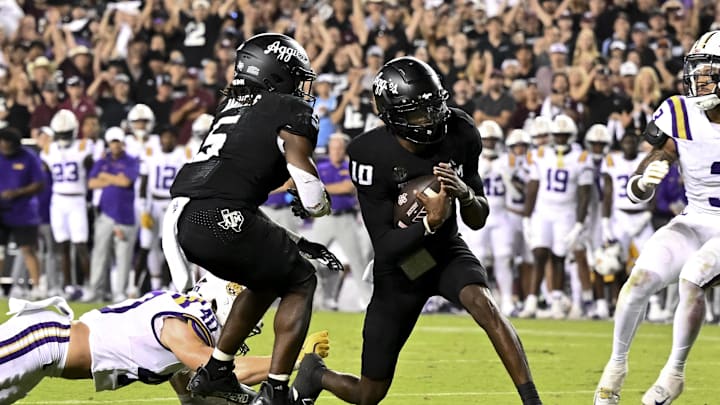 Oct 26, 2024; College Station, Texas, USA; Texas A&M Aggies quarterback Marcel Reed (10) runs the ball in for a touchdown in the third quarter against the LSU Tigers at Kyle Field. Mandatory Credit: Maria Lysaker-Imagn Images. 