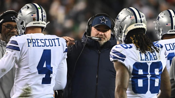 Jan 8, 2022; Philadelphia, Pennsylvania, USA; Dallas Cowboys head coach Mike McCarthy (M) celebrates with Cowboys quarterback Dak Prescott (4) and Cowboys wide receiver CeeDee Lamb (88) on the sidelines after a touchdown against the Philadelphia Eagles during the second quarter at Lincoln Financial Field. Mandatory Credit: Tommy Gilligan-Imagn Images