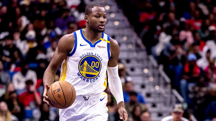 Nov 22, 2024; New Orleans, Louisiana, USA;  Golden State Warriors forward Jonathan Kuminga (00) brings the ball up court against the New Orleans Pelicans during second half at Smoothie King Center. Mandatory Credit: Stephen Lew-Imagn Images
