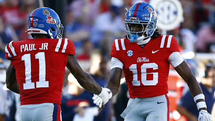 Sep 7, 2024; Oxford, Mississippi, USA; Mississippi Rebels defensive back Yam Banks (16) reacts with linebacker Chris Paul Jr. (11) during the second half  against the Middle Tennessee Blue Raiders at Vaught-Hemingway Stadium. Mandatory Credit: Petre Thomas-Imagn Images