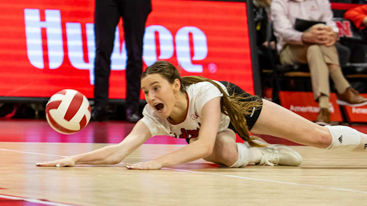 Bergen Reilly gets the pancake to add to her dig total vs. the Minnesota Golden Gophers inside the Bob Devaney Sports Center.