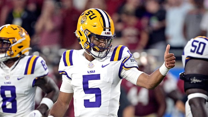Sep 3, 2023; Orlando, Florida, USA; LSU Tigers quarterback Jayden Daniels (5) gives a thumbs up