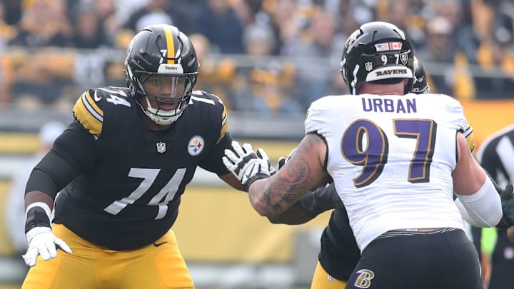 Nov 17, 2024; Pittsburgh, Pennsylvania, USA;  Pittsburgh Steelers guard Spencer Anderson (74) blocks at the line of scrimmage against Baltimore Ravens defensive end Brent Urban (97) during the second quarter at Acrisure Stadium. Mandatory Credit: Charles LeClaire-Imagn Images