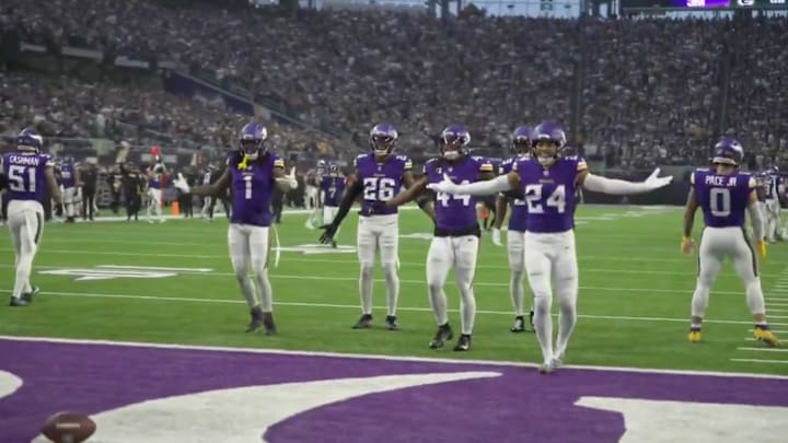 Vikings players celebrate Cam Bynum's fumble recovery against the Packers Vikings players celebrate Cam Bynum's fumble recovery against the Packers