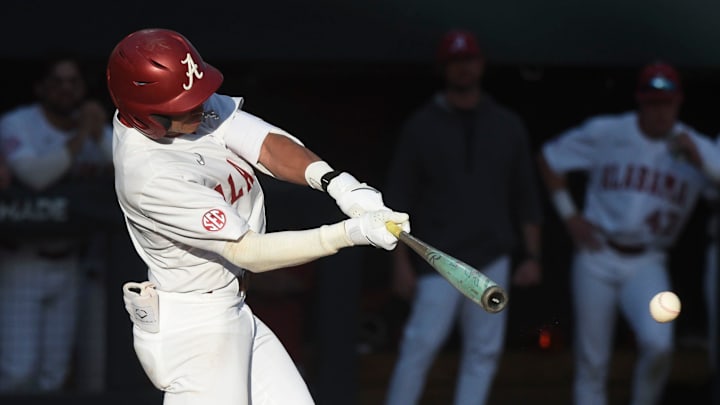 Feb 23, 2024; Tuscaloosa, Alabama, USA; Alabama batter Justin Lebron connects for a hit during the opening game of the weekend series with Valparaiso at Sewell-Thomas Stadium.
