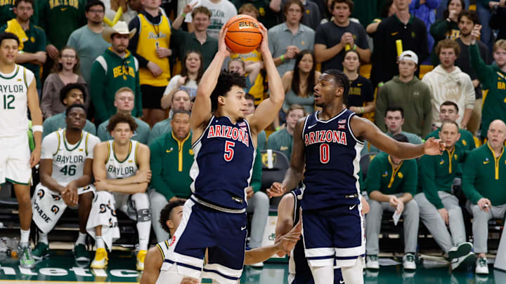Feb 24, 2026; Waco, Texas, USA; Arizona Wildcats guard Brayden Burries (5) grabs a rebound against the Baylor Bears during the second half at Paul and Alejandra Foster Pavilion. Mandatory Credit: Chris Jones-Imagn Images Feb 24, 2026; Waco, Texas, USA; Arizona Wildcats guard Brayden Burries (5) grabs a rebound against the Baylor Bears during the second half at Paul and Alejandra Foster Pavilion. Mandatory Credit: Chris Jones-Imagn Images