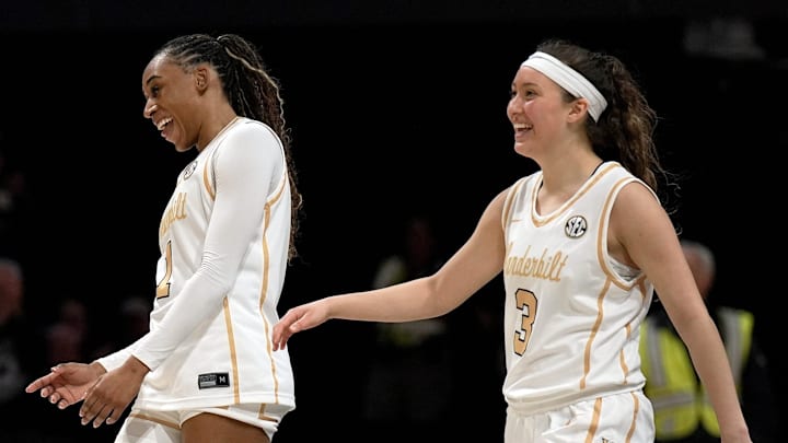 Vanderbilt guard Mikayla Blakes (1) reacts after making a three point basket against Alabama as Aubrey Galvan (3) celebrates with her during the second half of an NCAA college basketball game at Memorial Gymnasium Thursday, Feb. 26, 2026, in Nashville, Tenn. Vanderbilt won 85-60.