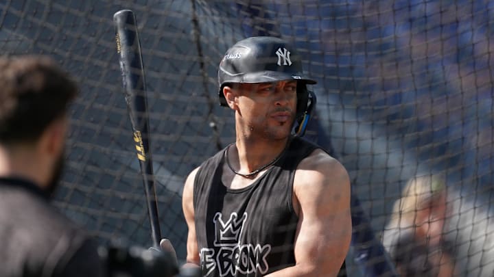 Oct 4, 2025; Toronto, Ontario, CAN; New York Yankees designated hitter Giancarlo Stanton (27) takes batting practice before game one against the Toronto Blue Jays in the ALDS round for the 2025 MLB playoffs at Rogers Centre. Mandatory Credit: Nick Turchiaro-Imagn Images