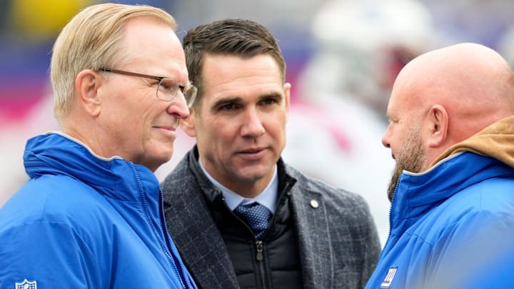 New York Giants co-owner John Mara (left) and New York Giants General Manager Joe Schoen speak with New York Giants Head Coach Brian Daboll.