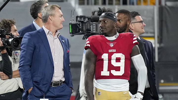 John Lynch and Deebo Samuel during the 49ers' 37–15 win over the Panthers on Oct. 9, 2022.