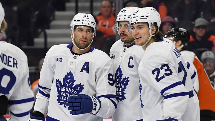 Jan 7, 2025; Philadelphia, Pennsylvania, USA; Toronto Maple Leafs center John Tavares (91), center Auston Matthews (34), and left wing Matthew Knies (23) against the Philadelphia Flyers at Wells Fargo Center. Mandatory Credit: Eric Hartline-Imagn Images Jan 7, 2025; Philadelphia, Pennsylvania, USA; Toronto Maple Leafs center John Tavares (91), center Auston Matthews (34), and left wing Matthew Knies (23) against the Philadelphia Flyers at Wells Fargo Center. Mandatory Credit: Eric Hartline-Imagn Images