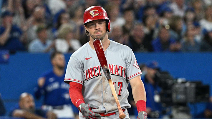 Cincinnati Reds shortstop Kyle Farmer (17) reacts after striking out.