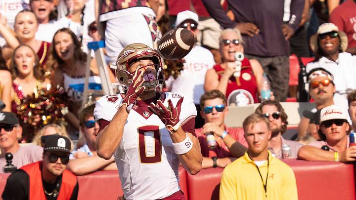 Sep 19, 2026; Tuscaloosa, AL, USA; Florida State wide receiver Duce Robinson (0) catches a touchdown pass after Alabama Dijon Lee Jr. (5) fell down, leaving him uncovered at Saban Field at Bryant-Denny Stadium. Mandatory Credit: Gary Cosby Jr.-Tuscaloosa News Sep 19, 2026; Tuscaloosa, AL, USA; Florida State wide receiver Duce Robinson (0) catches a touchdown pass after Alabama Dijon Lee Jr. (5) fell down, leaving him uncovered at Saban Field at Bryant-Denny Stadium. Mandatory Credit: Gary Cosby Jr.-Tuscaloosa News