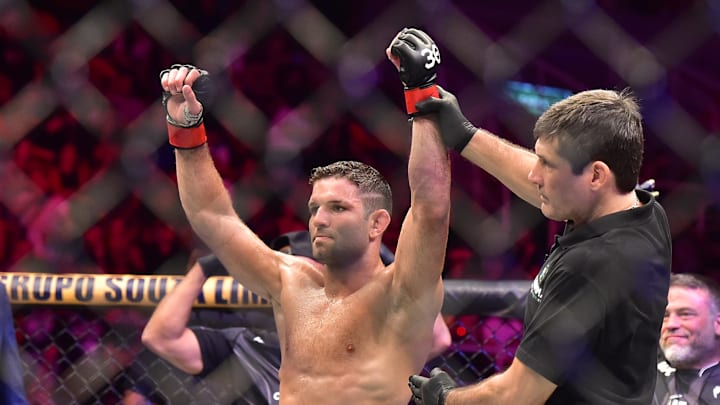 Jan 21, 2023; Rio de Janeiro, Brazil; Thiago Moises (red gloves) reacts after the fight against Melquizael Costa (blue gloves) during UFC 283 at Jeunesse Arena. Mandatory Credit: Jason da Silva-USA TODAY Sports