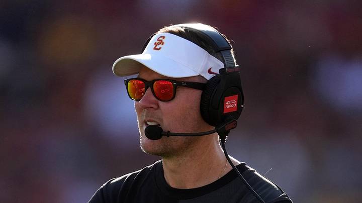Aug 30, 2025; Los Angeles, California, USA; Southern California Trojans head coach Lincoln Riley watches from the sidelines against the Missouri State Bears in the first half at United Airlines Field at Los Angeles Memorial Coliseum. 