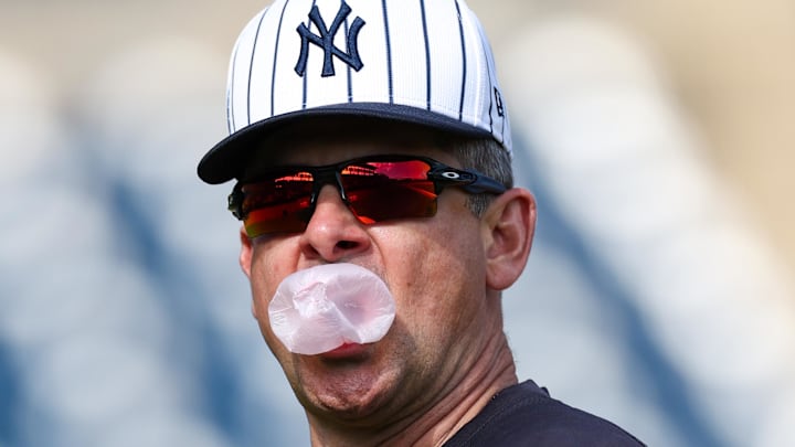 New York Yankees manager Aaron Boone participates in spring training workouts.