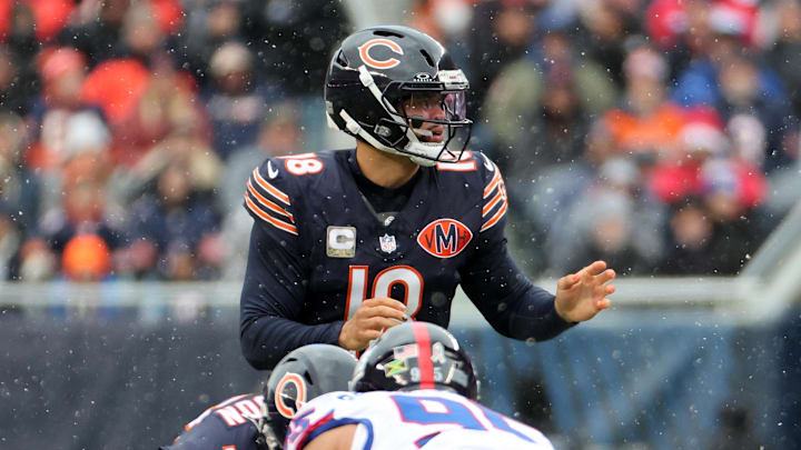 Nov 9, 2025; Chicago, Illinois, USA; Chicago Bears quarterback Caleb Williams (18) reacts against the New York Giants during the first half at Soldier Field. Mandatory Credit: Mike Dinovo-Imagn Images
