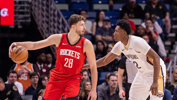 Dec 18, 2025; New Orleans, Louisiana, USA; Houston Rockets center Alperen Sengun (28) dribbles against New Orleans Pelicans center Derik Queen (22) during the first half at Smoothie King Center. Mandatory Credit: Stephen Lew-Imagn Images Dec 18, 2025; New Orleans, Louisiana, USA; Houston Rockets center Alperen Sengun (28) dribbles against New Orleans Pelicans center Derik Queen (22) during the first half at Smoothie King Center. Mandatory Credit: Stephen Lew-Imagn Images
