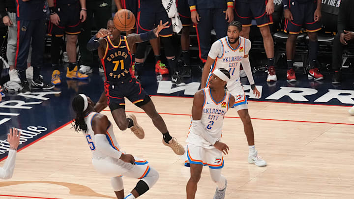 Jan 29, 2025; San Francisco, California, USA; Golden State Warriors guard Dennis Schroder (71) is called for an offensive foul after jumping into Oklahoma City Thunder guard Luguentz Dort (5) in the fourth quarter at the Chase Center. Mandatory Credit: Cary Edmondson-Imagn Images Jan 29, 2025; San Francisco, California, USA; Golden State Warriors guard Dennis Schroder (71) is called for an offensive foul after jumping into Oklahoma City Thunder guard Luguentz Dort (5) in the fourth quarter at the Chase Center. Mandatory Credit: Cary Edmondson-Imagn Images
