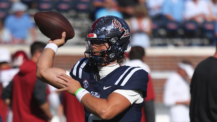 Oct 26, 2024; Oxford, Mississippi, USA; Mississippi Rebels quarterback Jaxson Dart (2) passes the ball during warm ups prior to the game against the Oklahoma Sooners at Vaught-Hemingway Stadium. Mandatory Credit: Petre Thomas-Imagn Images