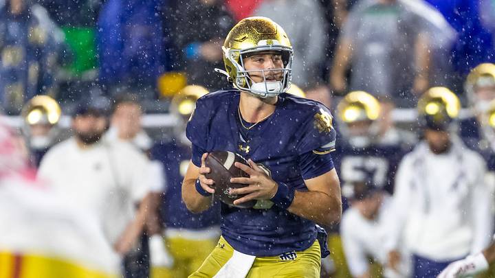Notre Dame quarterback CJ Carr and the Fighting Irish are in the lead for the College Football Playoff’s top seed. Notre Dame quarterback CJ Carr and the Fighting Irish are in the lead for the College Football Playoff’s top seed.