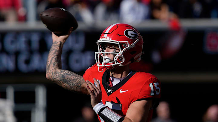Georgia quarterback Carson Beck (15) throws a pass during the first half of a NCAA college football game against Massachusetts in Athens, Ga., on Saturday, Nov. 23, 2024. Georgia quarterback Carson Beck (15) throws a pass during the first half of a NCAA college football game against Massachusetts in Athens, Ga., on Saturday, Nov. 23, 2024.