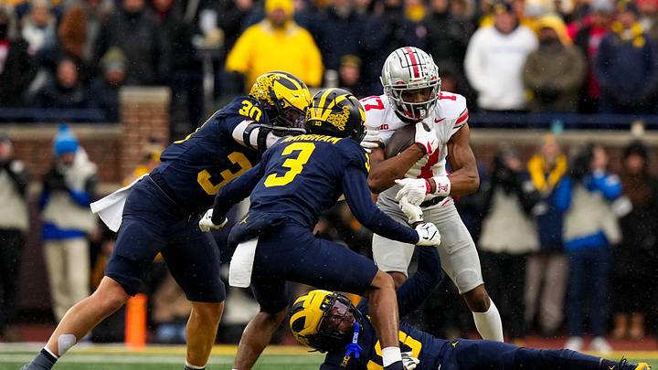 Ohio State Buckeyes wide receiver Carnell Tate (17) runs the ball against the Michigan Wolverines in the first half of the NCAA football game at Michigan Stadium on Saturday, Nov. 29, 2025 in Ann Arbor, Michigan.